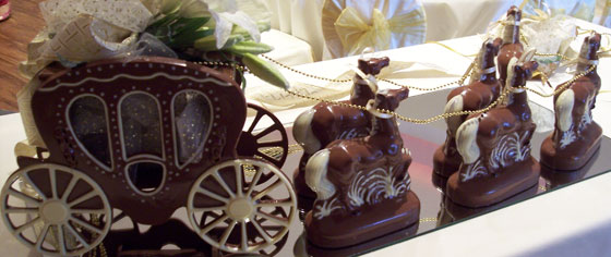 Hand-made milk and white chocolate wedding carriage and horses