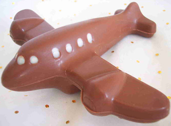 picture of milk chocolate aeroplane decorated with white chocolate
