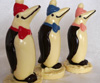 a picture of three white chocolate penguins
