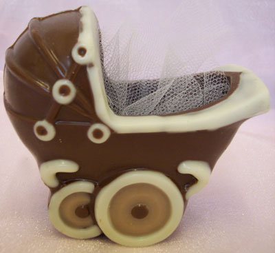 a picture of a milk chocolate pushchair decorated with milk chocolate