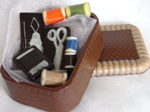 a picture of a chocolate sewing kit