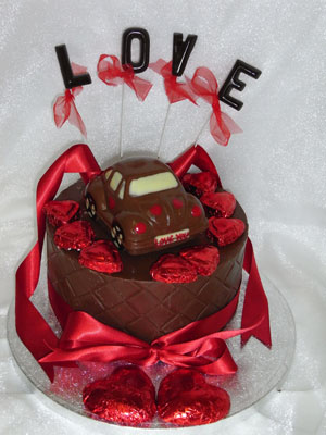 a picture of chocolate Valentine beetle car on single tier