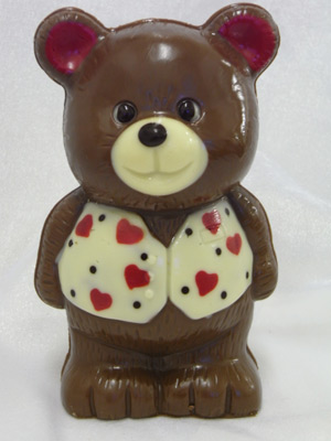 a picture of chocolate Valentine bear decorated with hearts